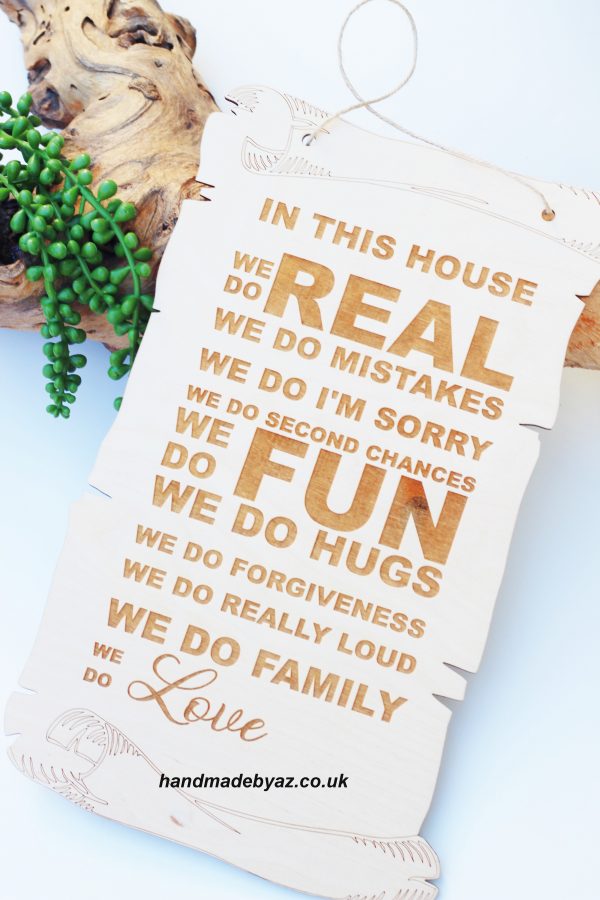 Hanging sign ,,In this house,,