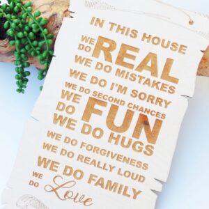 Hanging sign ,,In this house,,