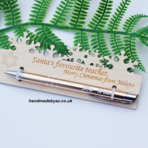 PERSONALISED Pad with pen ,, Santa's favourite Teacher,,