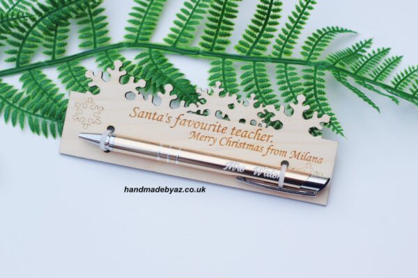 PERSONALISED Pad with pen ,, Santa's favourite Teacher,,
