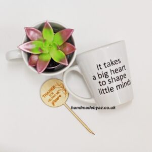 A FLOWER IN A CUP WITH TOPPER ,,It takes a big heart ...,,