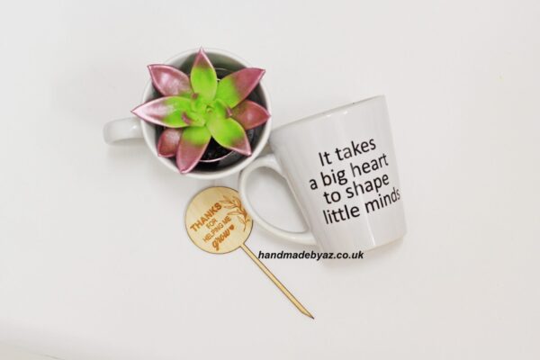 A FLOWER IN A CUP WITH TOPPER ,,It takes a big heart ...,,