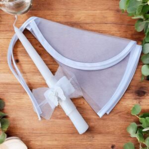 Christening Clothes with candle